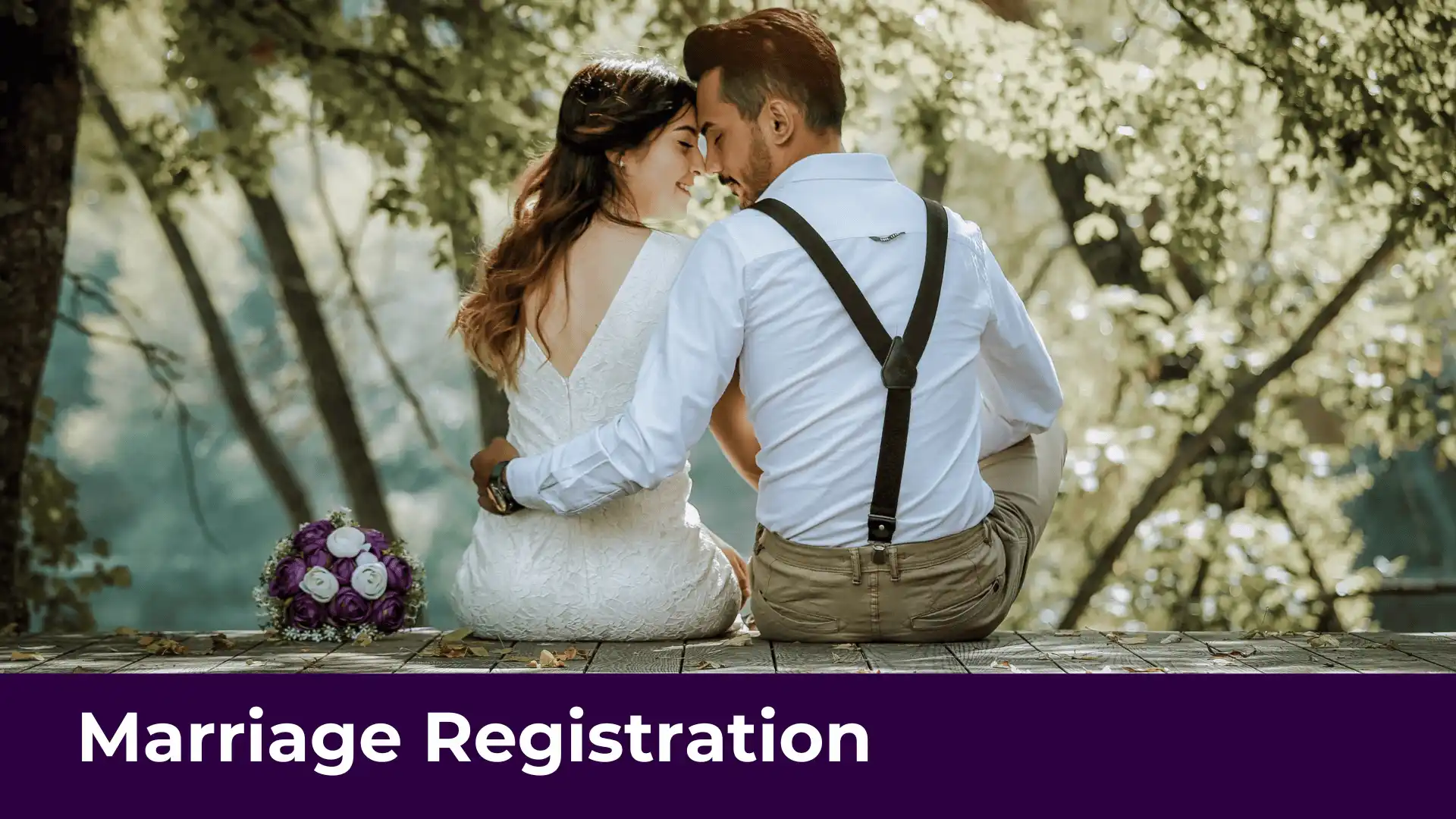 two people after getting married sitting on a stone step in the forest